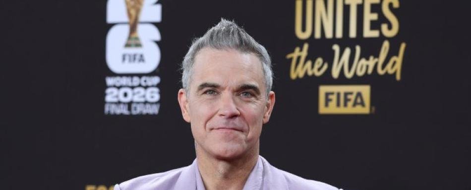Robbie Williams supera a The Beatles con récord de álbumes número uno en el Reino Unido